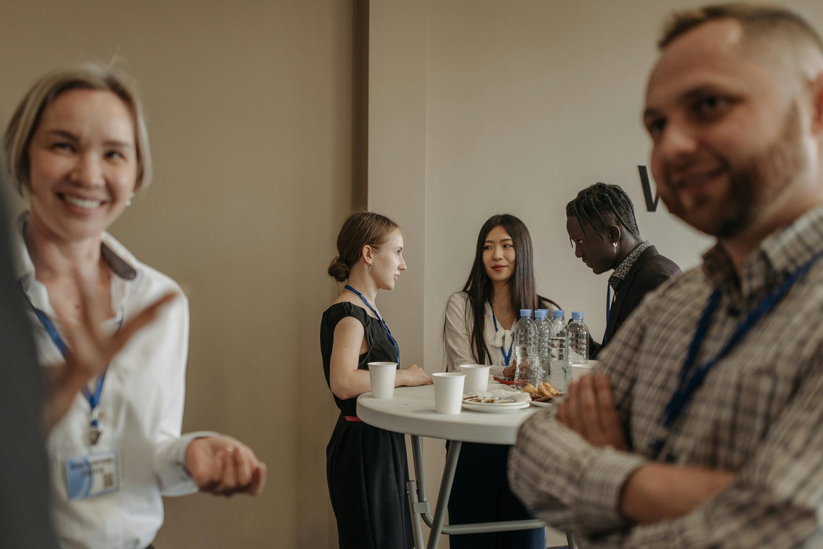 Professionals meeting during business event